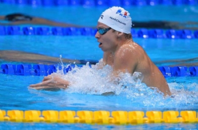 Phelps'in inanılmaz rekorunu Marchand kırdı